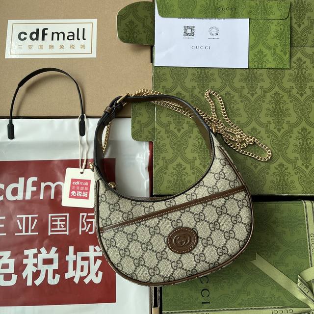 原厂皮配 Cdfmall三亚免税店手提袋 这款迷你手袋采用新月形轮廓和质感 散发出浓郁的复古格调 复古 素糅合典藏设计或时尚细节 呈现超越时空限制的焕新设计 处