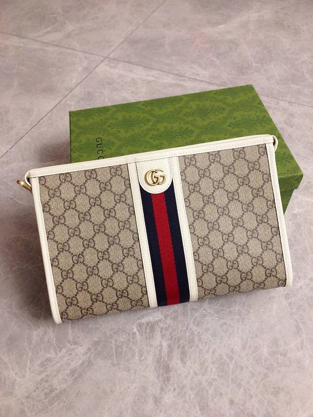 Gucci 古奇 顶级原单货专柜新款手拿包流行款 高端大气 时尚有品味 最新顶级专柜专用材料配皮专用头层牛皮 手感好厚度足 专柜标准布 超级实用 专柜五金配件