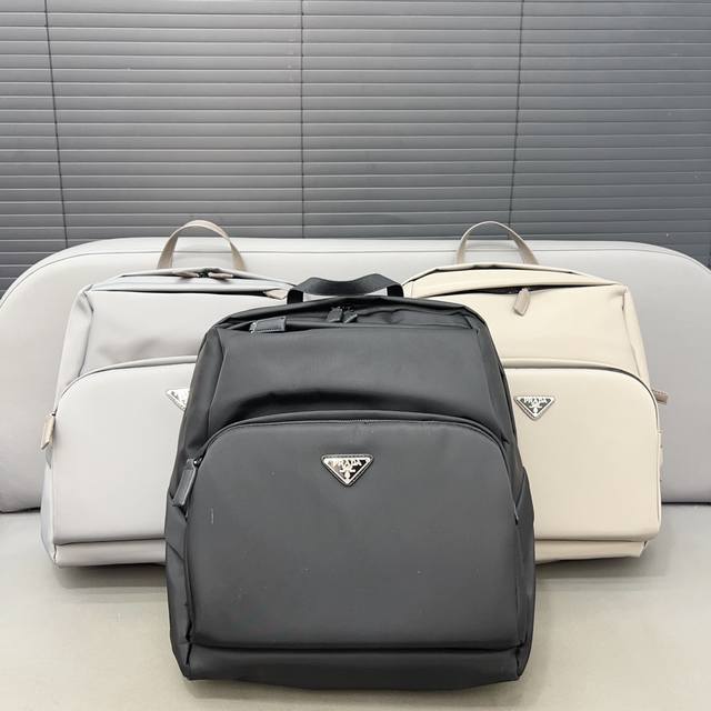 Prada 普拉达 Re-Nylon 尼龙布双肩包 背包 男女通用 原厂防水布材质 电镀五金 高端货 规格:32 X 41Cm