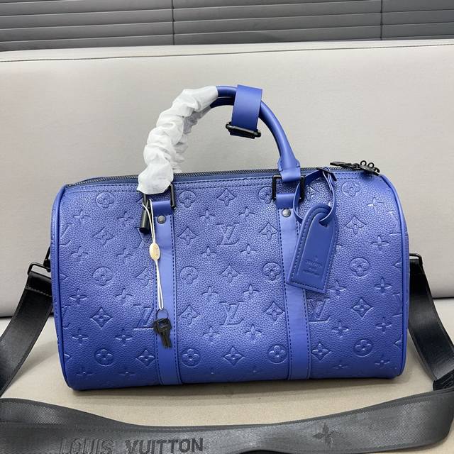 Louisvuitton 路易威登 Keepall35 旅行袋 手提包袋 机场包 采用精湛镶嵌细工，实物拍摄 原厂原版面料 配送防尘袋 35 X 21 Cm。