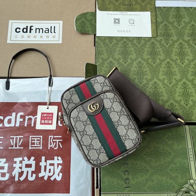 原厂皮配 Cdfmall三亚免税店手提袋 Ophidia系列gg迷你手袋。小件旅行配饰仍是gucci皮具甄选中不可或缺的一大亮点，潜心致敬品牌的奢侈旅行本源。源