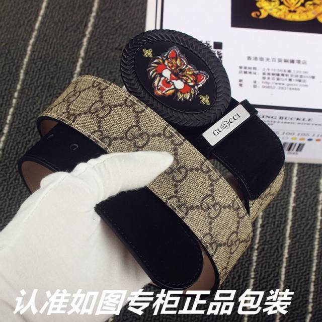 品名：古奇.Gu Cci原单 型号：认准如图专柜包装，赠送打孔器 材料：百分百头层牛皮，保证真皮。24K纯钢扣，红绿布拼色工艺专柜同等质量， 送人自用首选 包装