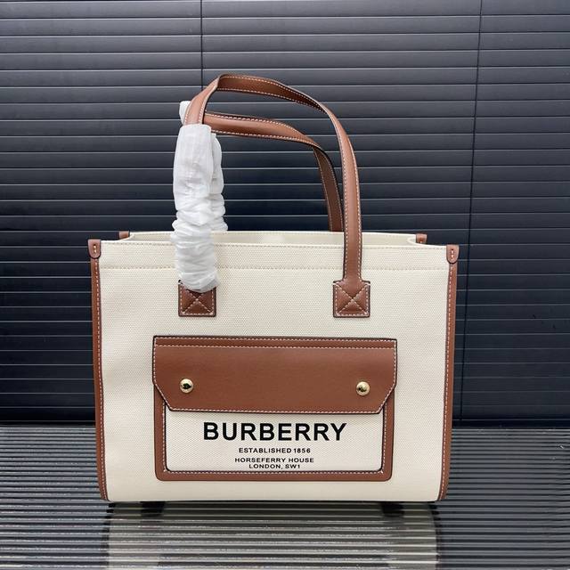 Burberry 巴宝莉 Ferya 芙蕾雅包 帆布托特包 男女通用手提包 采用精湛镶嵌细工 经典百搭 实物拍摄 原厂原版面料 配送防尘袋 40 X 30 Cm