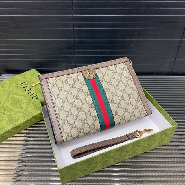 Gucci 古奇gg Ophidia 系列手拿包 手包 采用精湛镶嵌细工，经典百搭 实物拍摄 原厂原版面料 配送防尘袋礼盒 26 X 18Cm。